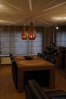 Set of rain lamps in walnut wood above table